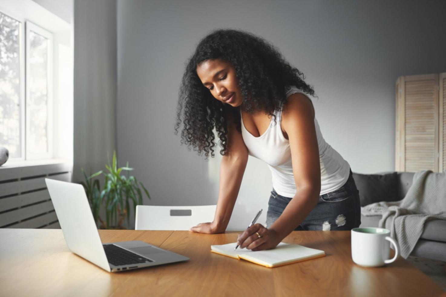 Corporate finance team reviewing quarterly reports and business metrics